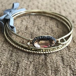 Set of 3- gold bangle bracelets.